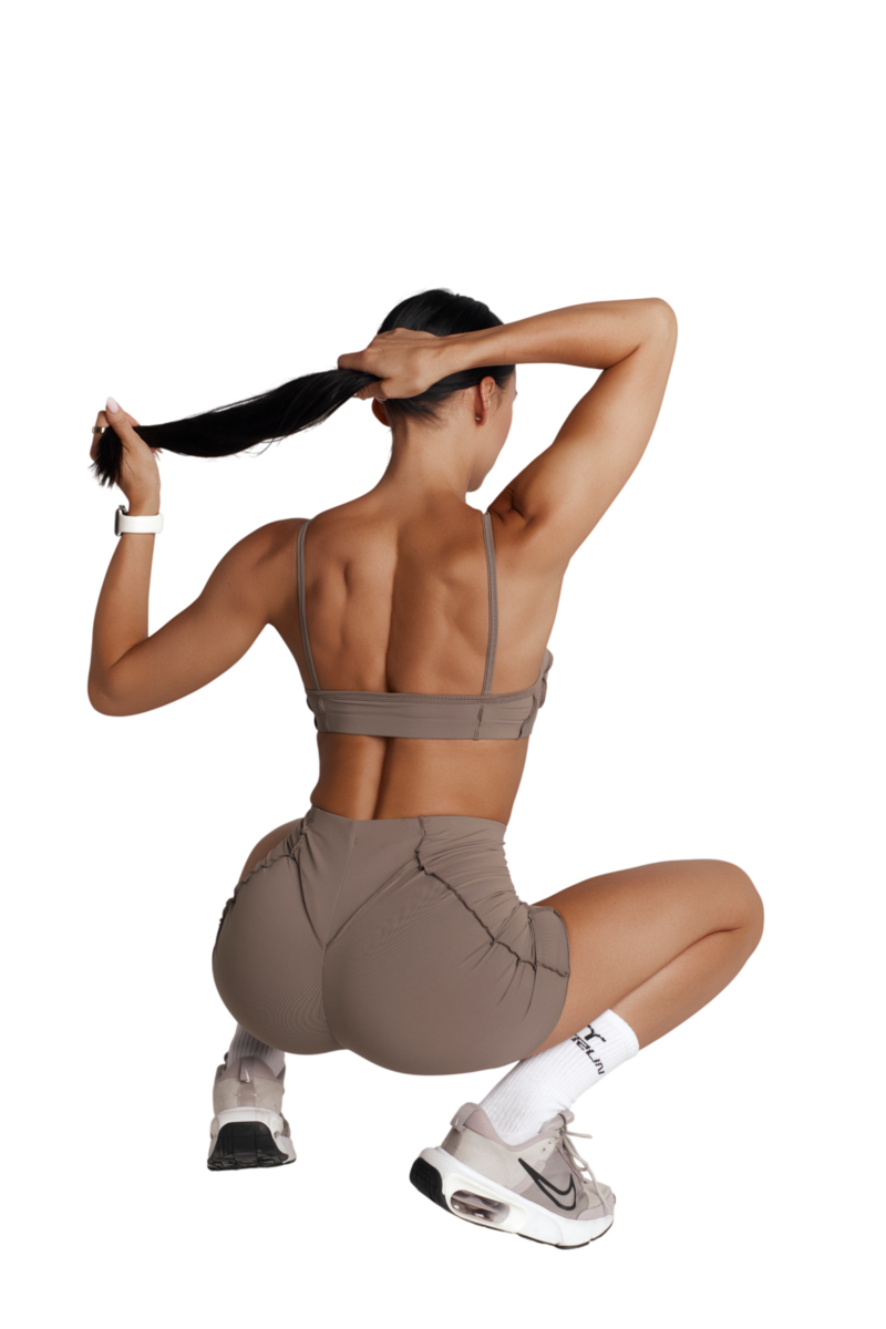 Get Fit Club coach demonstrating a strong, athletic body